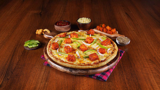 Order Chinese Schezwan Paneer Pizza Must Try From Ovenstory On Eatsure