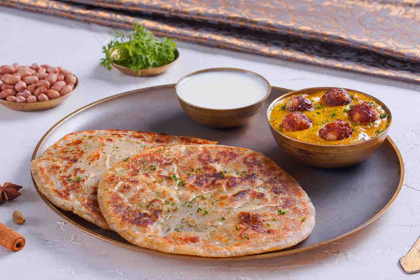 Order Sabudana Paratha Pcs With Malai Kofta Curry Mini Thali From