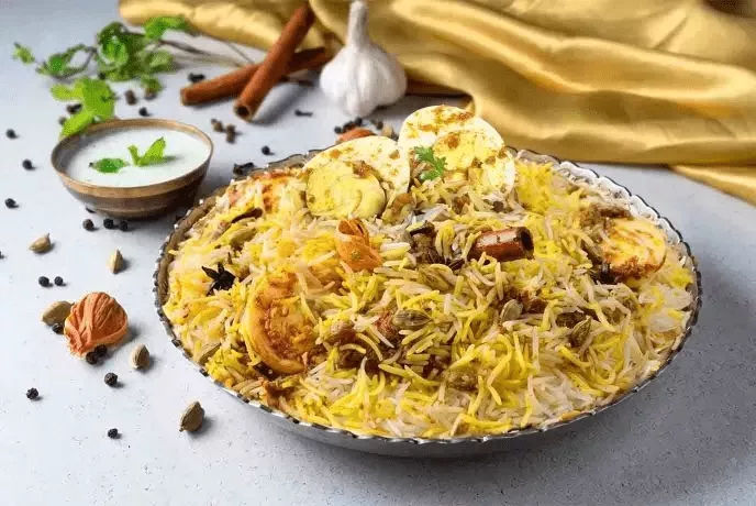 Order Zaikedaar Paneer Paneer Biryani Serves Free Coca Cola Bottle Ml From Behrouz