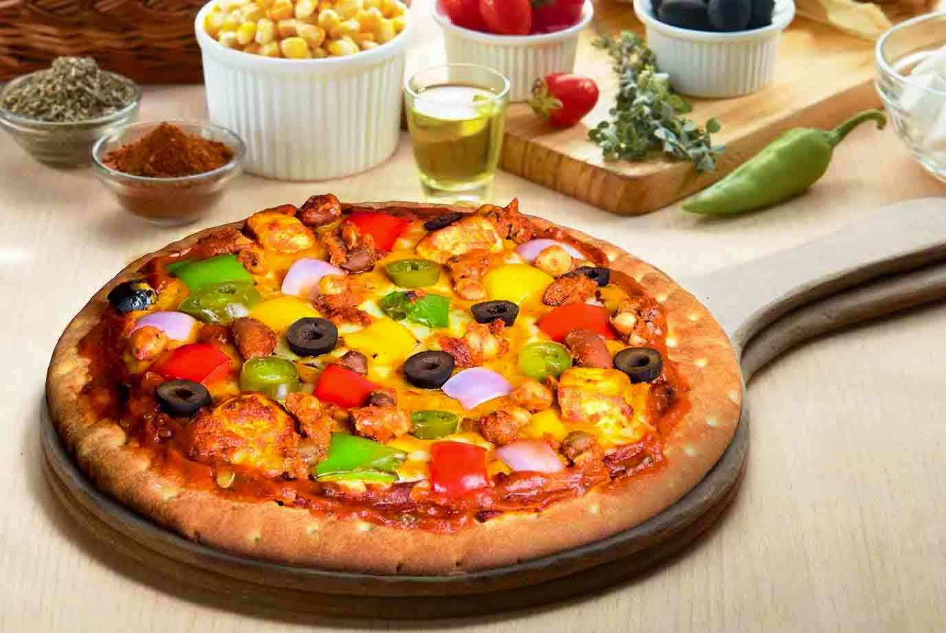 Order Maharaja Veg Pizza 11 Inch online from Ovenstory