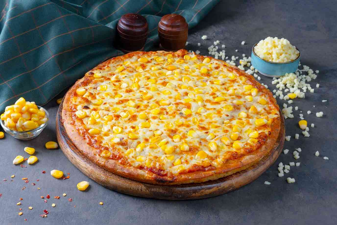 Order Corn And Cheese Cheese Burst Pizza from Ovenstory on EatSure