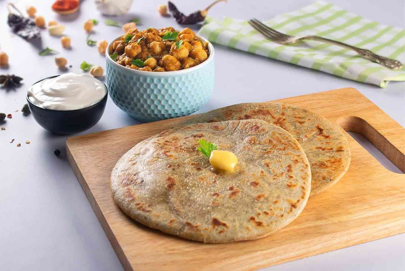 Aloo Paratha Chole And Curd Lunchbox