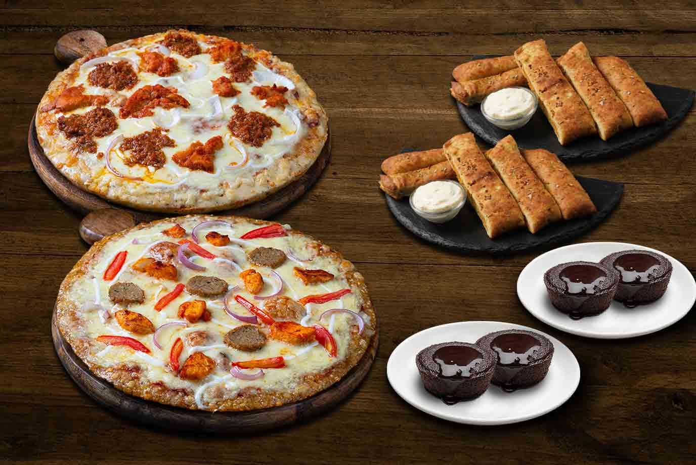 Order Western Chicken Non Veg Pizza Group Combo online from Ovenstory