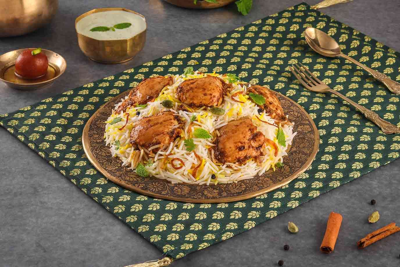 Order Lazeez Bhuna Murgh Chicken Dum Biryani Serves 1 2 From Behrouz