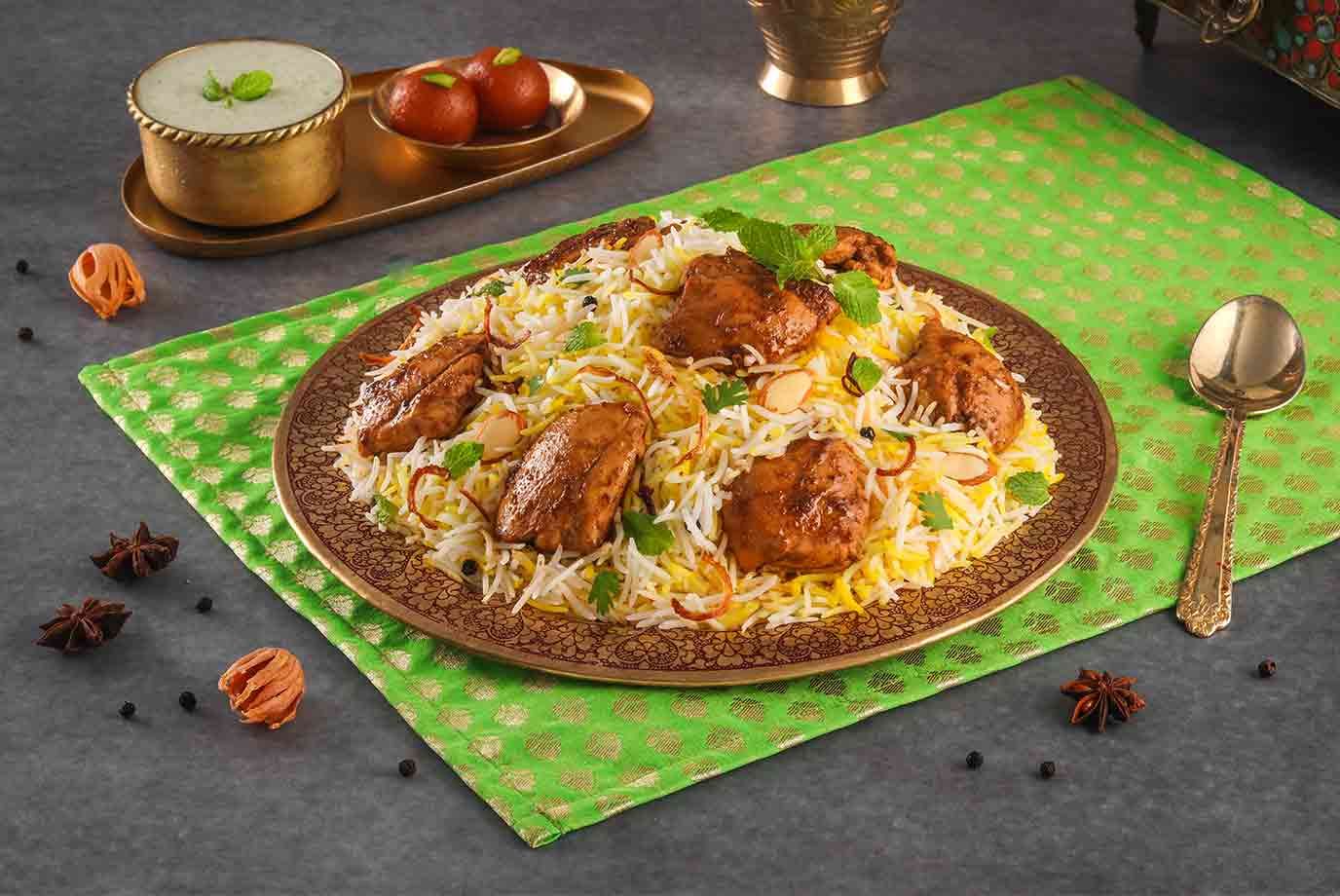 Order Spicy Bhuna Murgh Hyderabadi Chicken Dum Biryani Boneless Serves 2 From Behrouz Biryani On