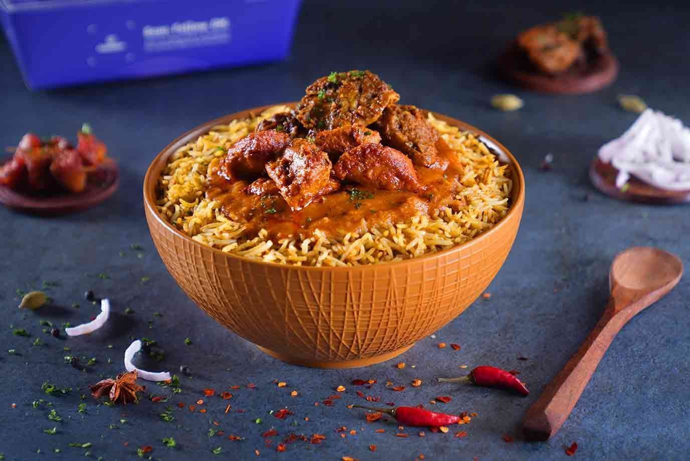 Order Chicken Bhuna And Chicken Tikka Rice Bowl Regular from Faasos on
