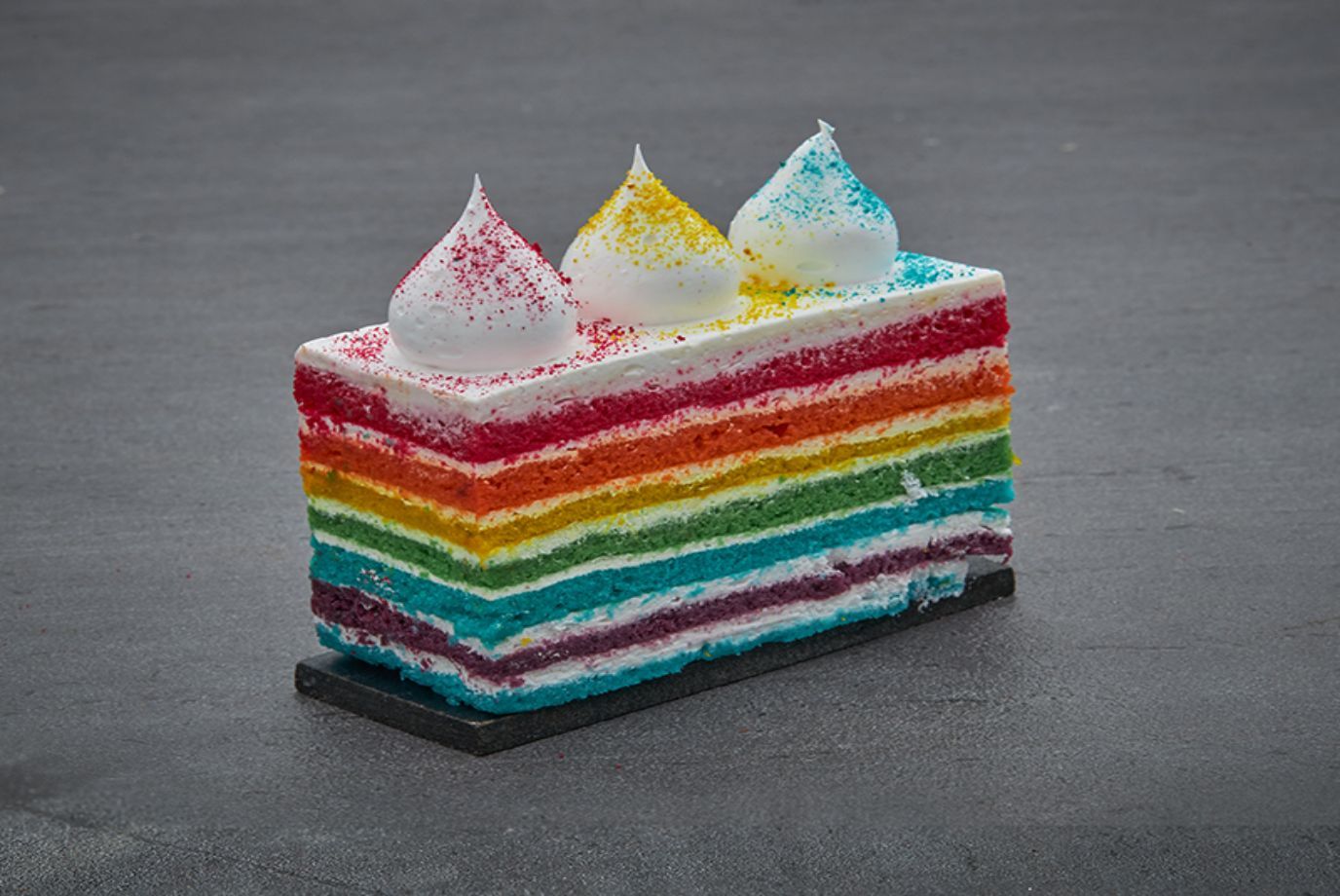 Order Rainbow Cake Slice from Smoor on EatSure