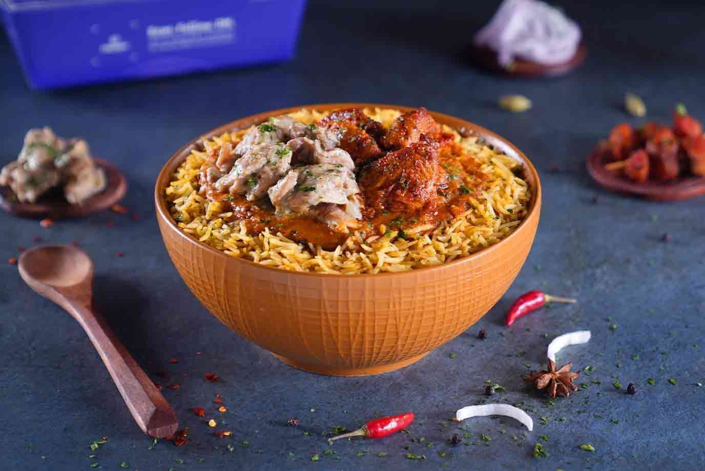 Order Reshmi Chicken And Chicken Tikka Rice Bowl Regular from Faasos on