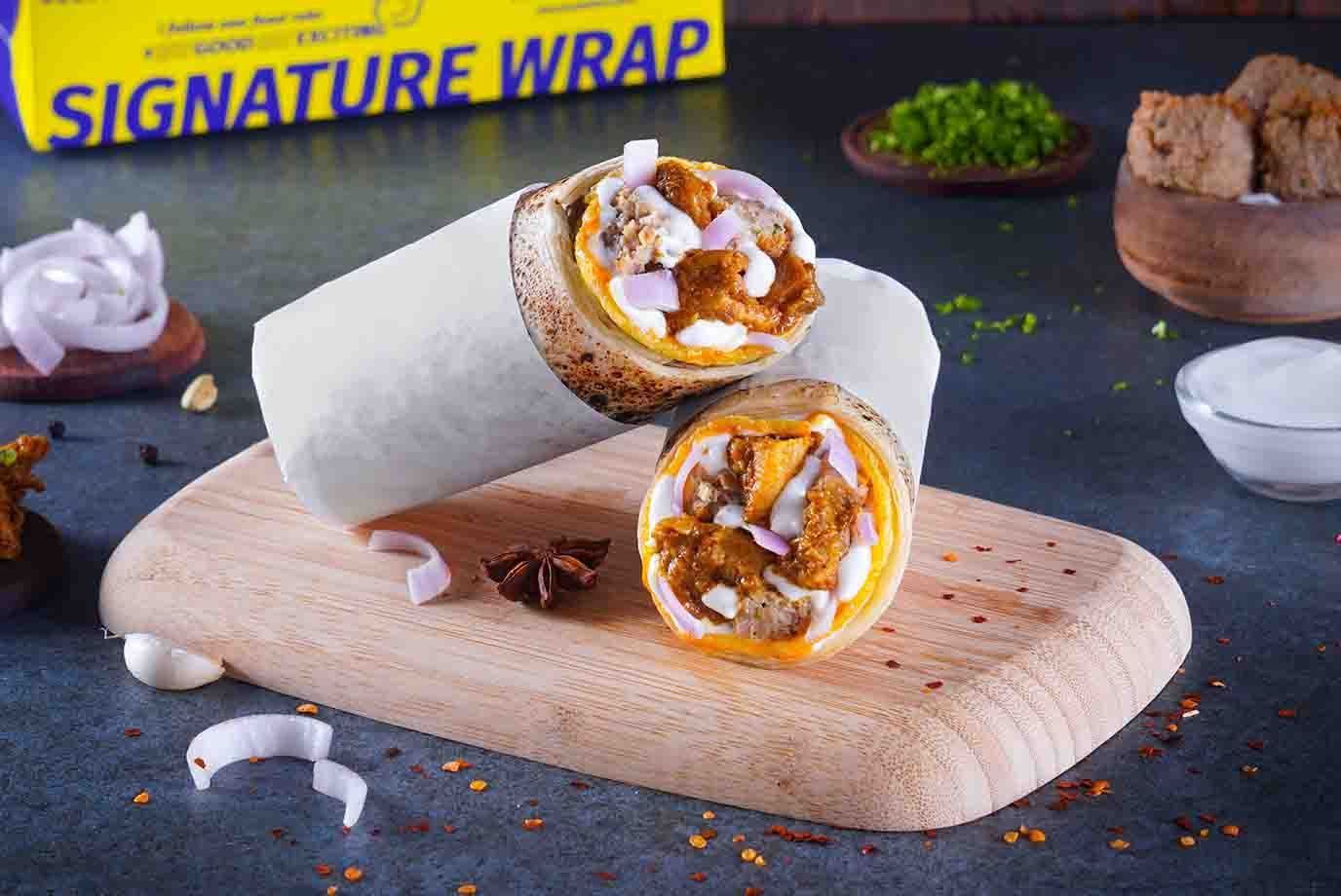 Order Bhuna Chicken Overload Wrap From Signature Wraps Rolls By Faasos