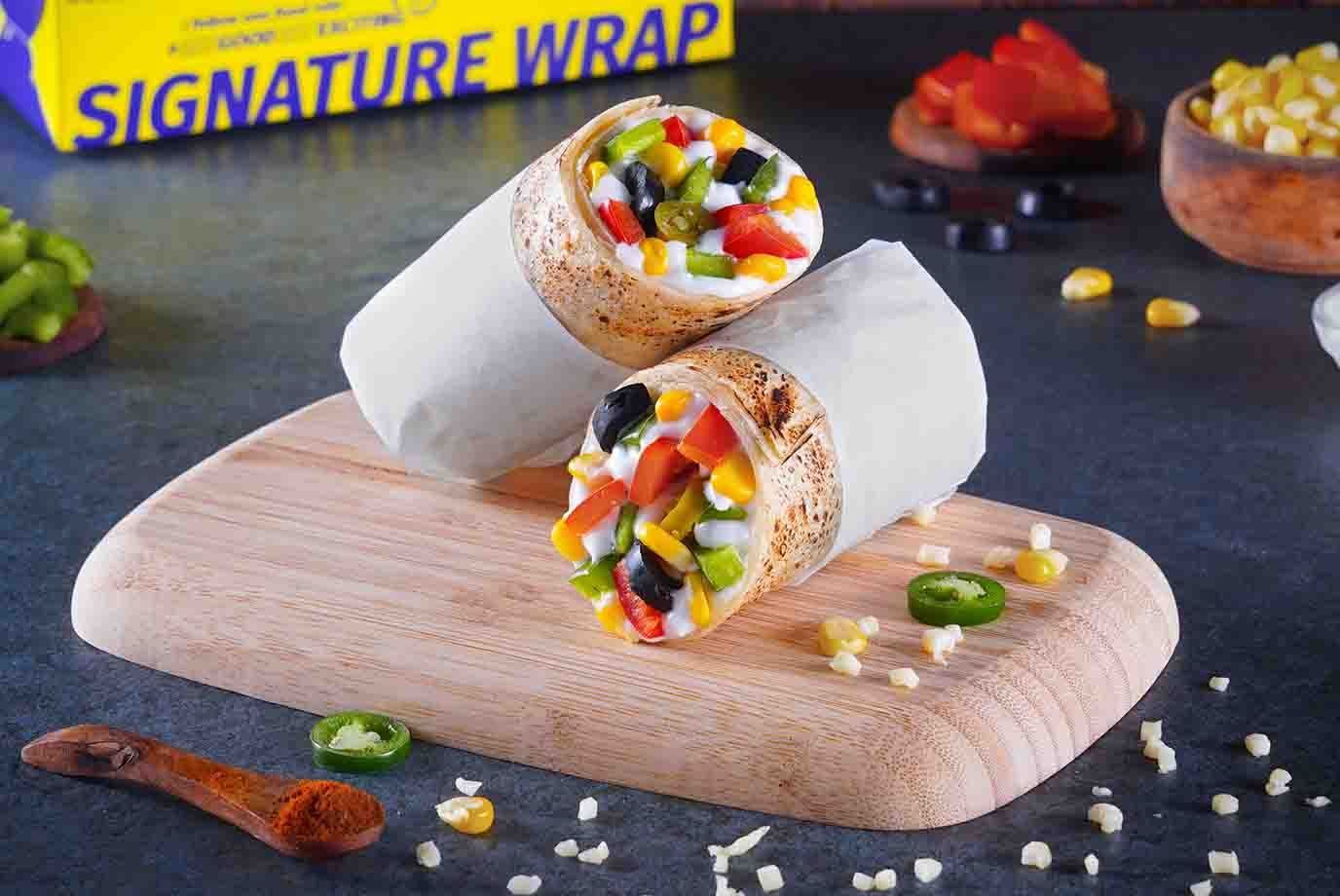 Order Baked Veggie Pizza Wrap from Signature Wraps Rolls By Faasos on