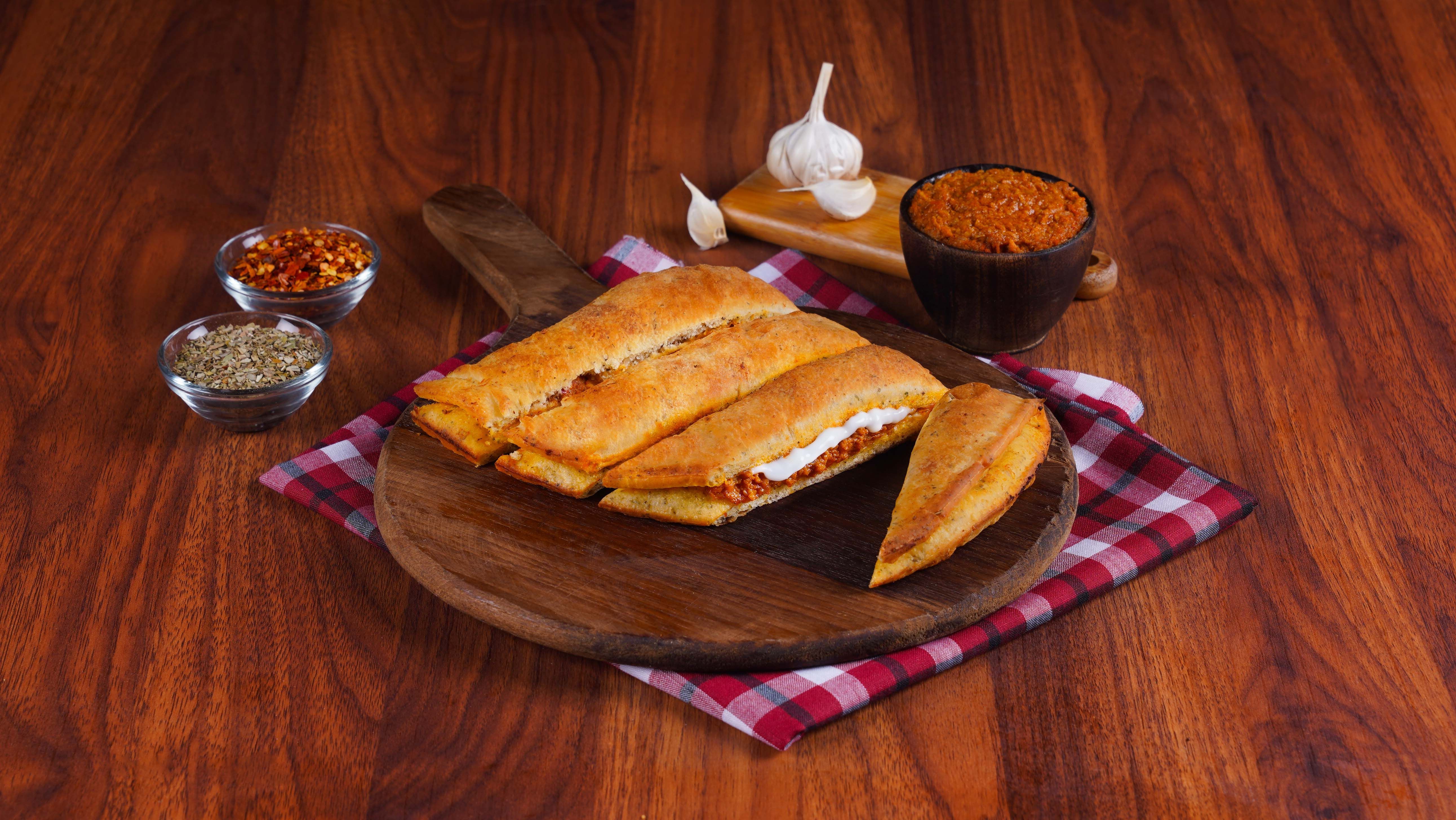 Order Chicken Kheema N Cheese Garlic Bread With Free Cheese Dip online