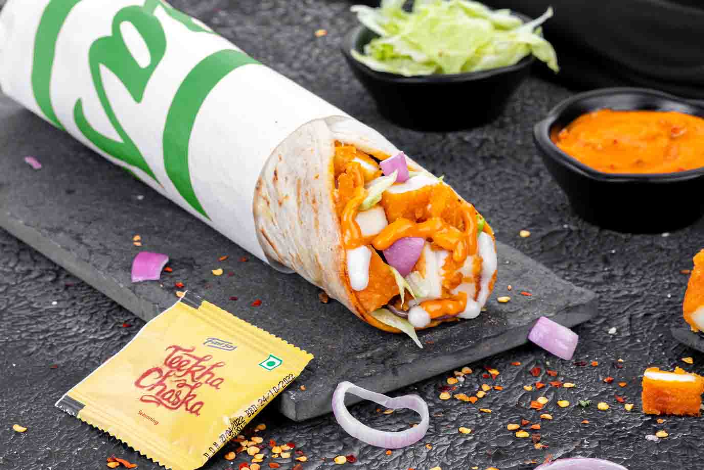 Order Newly Launched Spicy Paneer Burger Wrap from Signature Wraps Rolls By Faasos on EatSure