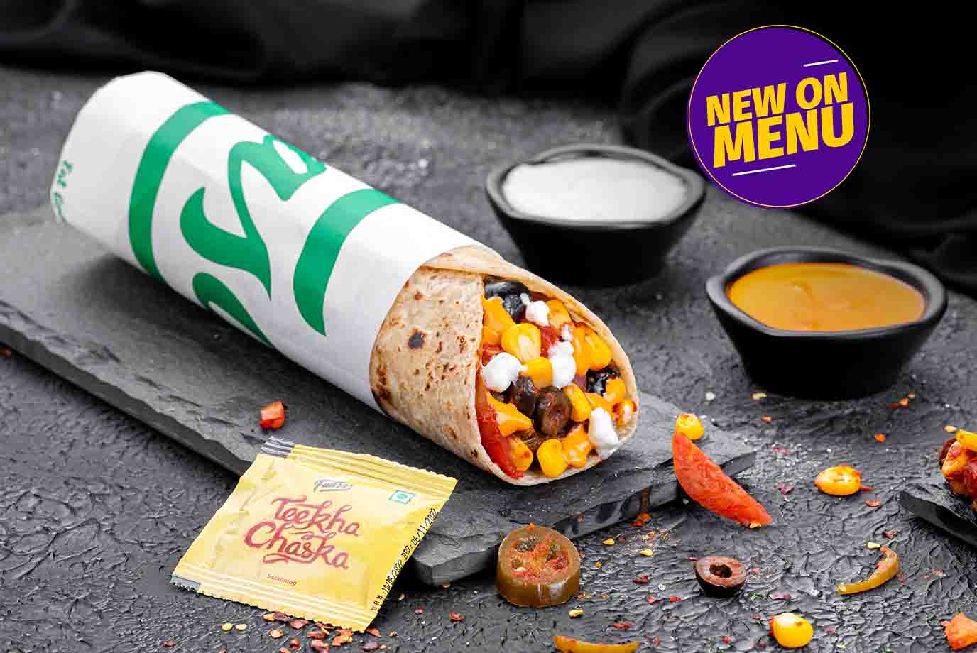 Order Cheesy Baked Pizza Wrap Veg from Signature Wraps Rolls By Faasos on EatSure
