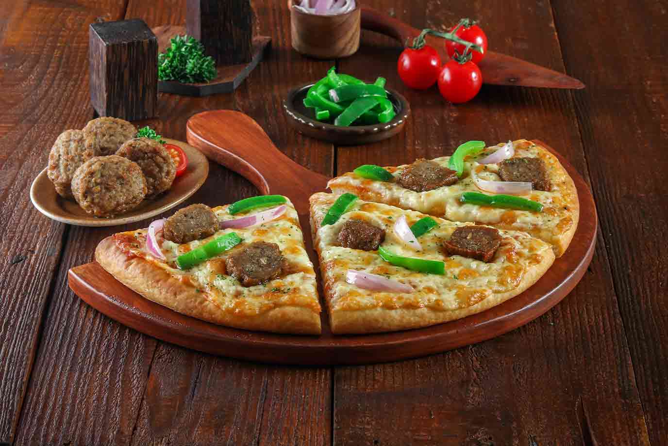 Order Semizza Half Pizza Chicken Meatballs And Chipotle Cheese Pizza from Ovenstory on EatSure