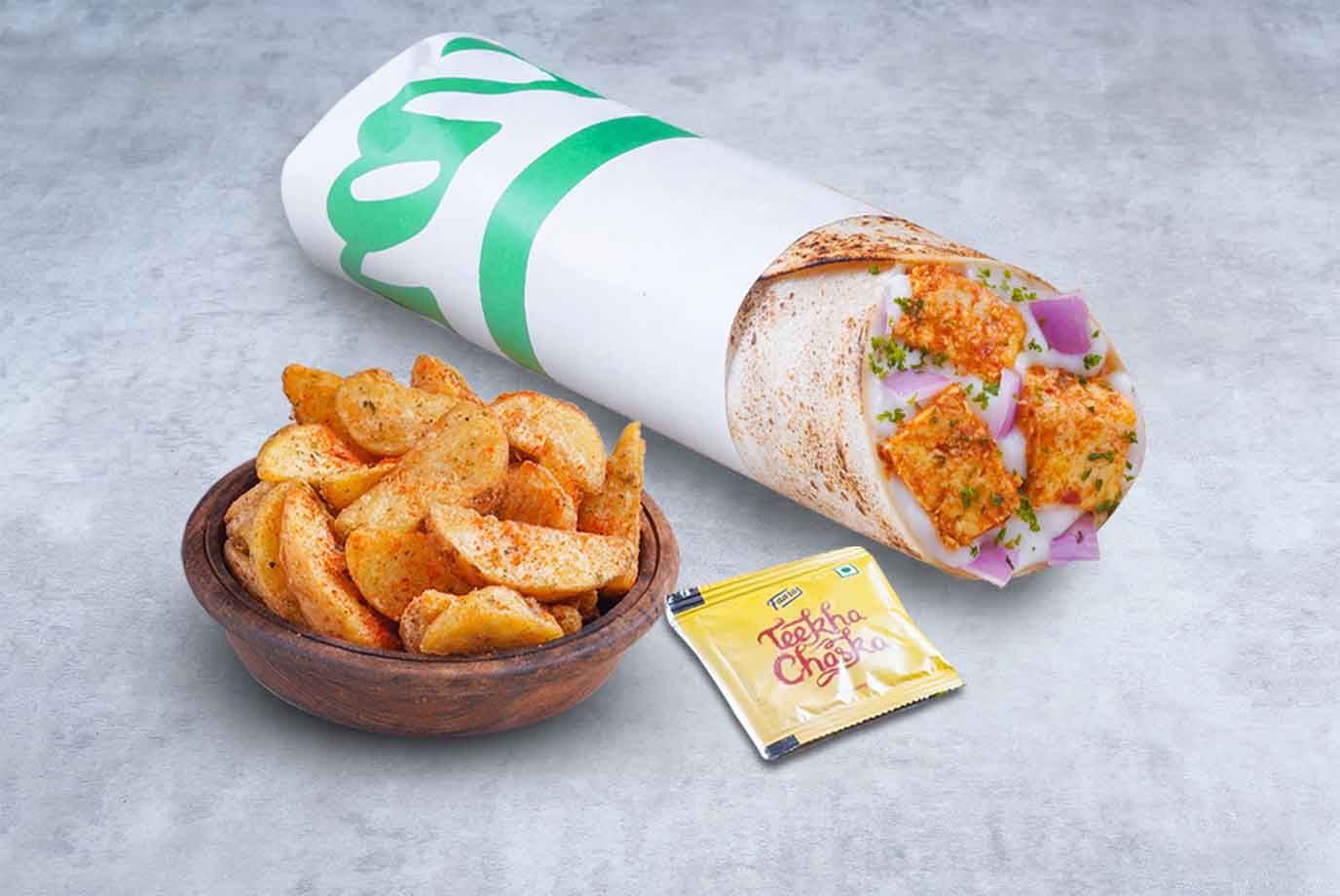 Order Cheese Melt Paneer Wrap And Wedges Mini Meal from Faasos on EatSure