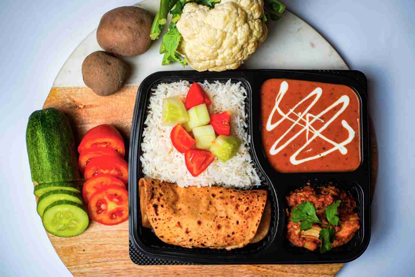 Order Express Veg Thali from Mealy Your Everyday Meal on EatSure
