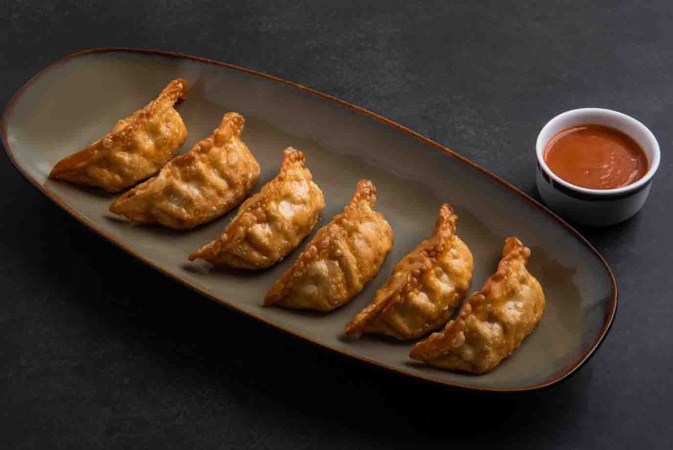 Order Crispy Fried Spicy Chicken Momos from Prasuma on EatSure